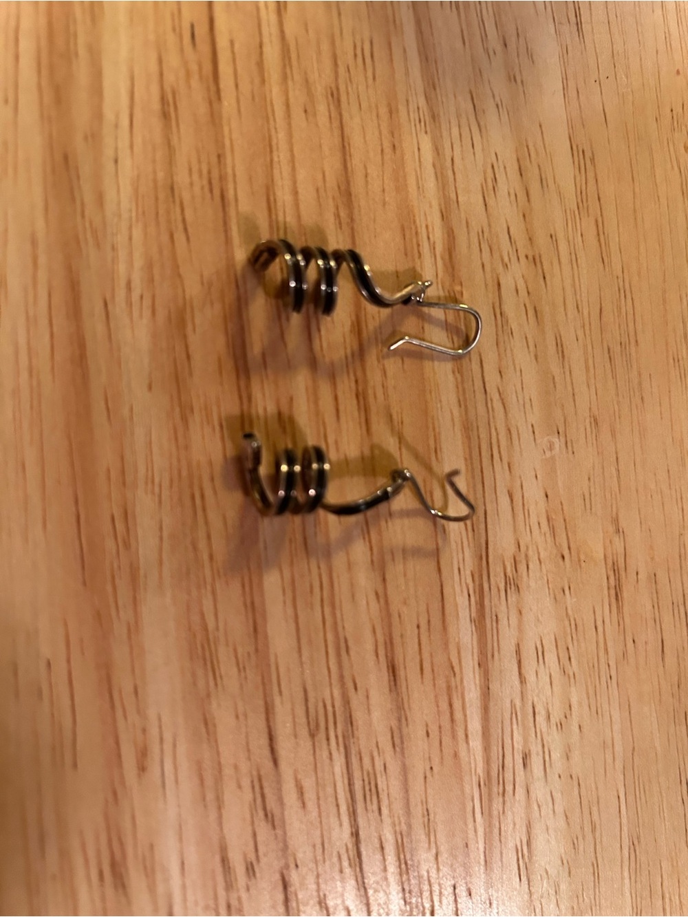 Silver and black Spiral Drop Earrings.